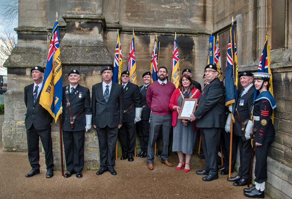 (centre, left to right) Leigh Caswell, a member of the council's housing advice and benefits team who serves as the council's armed forces champion, and the Mayor of Rugby, Cllr Maggie O'Rourke, joined members of the Rugby No.1 branch of the Royal British Legion at Sunday's service at St Andrew's Church.