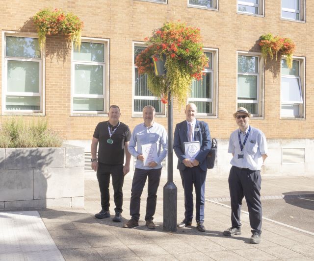 (left to right) John Howes, Rugby Borough Council's green space and biodiversity manager, Britain in Bloom judge Rob Dowling, fellow judge James Cordingley, and Colin Horton, council green spaces officer, depart the Town Hall at the start of the judging tour.