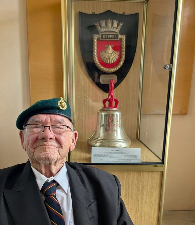 Veteran Derek Arrowsmith with the crest from the original HMS Keppel and the bell from the HMS Keppel built for the Royal Navy in the 1950s.